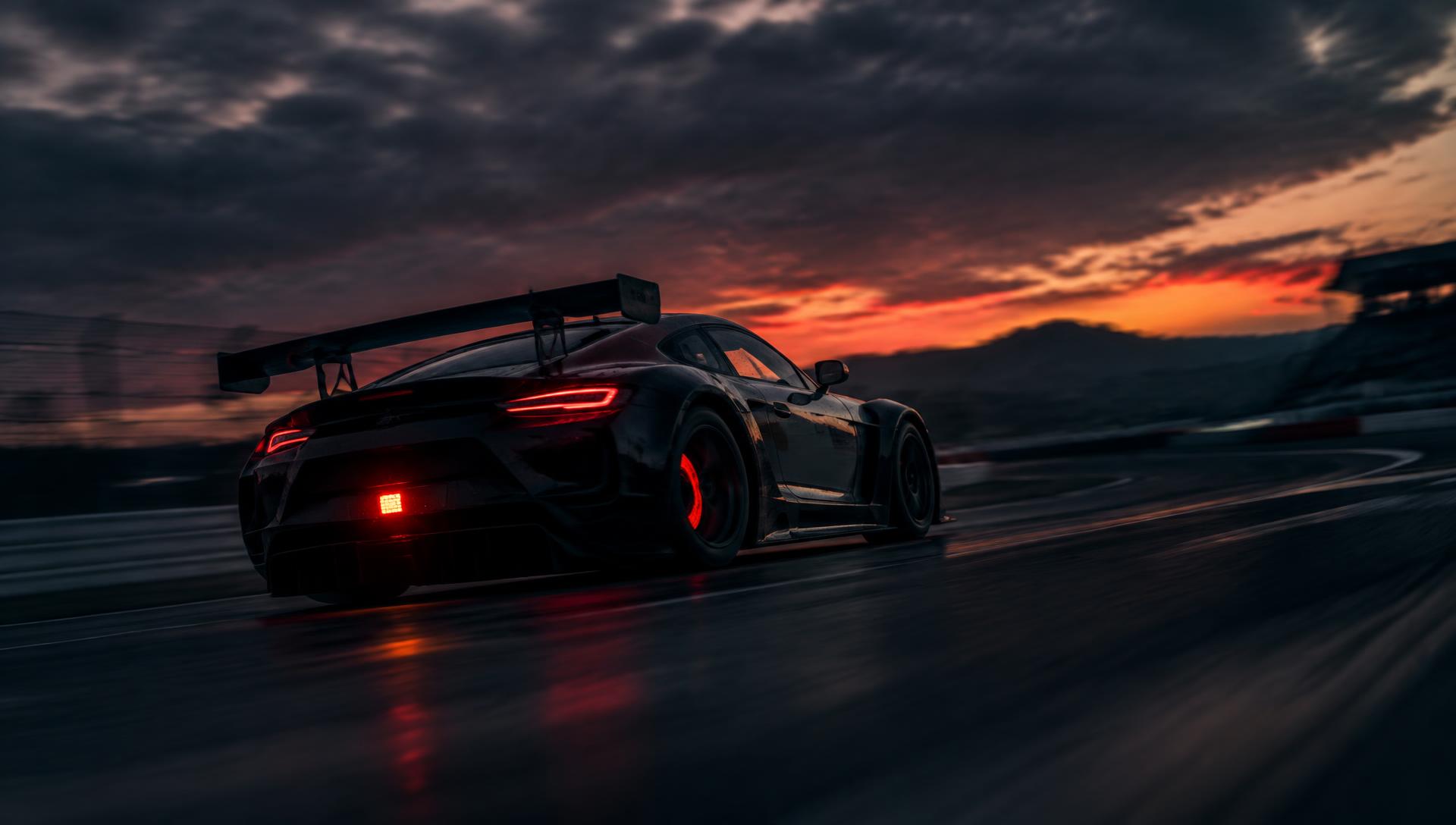 GT race car at speed at dusk